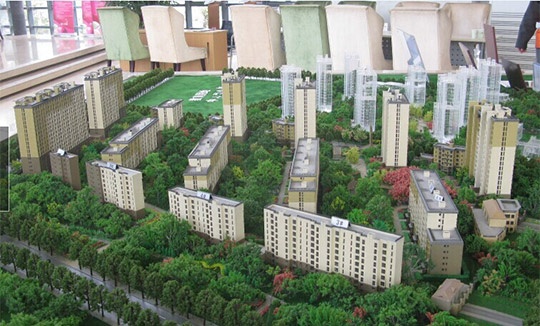 收房在即 北京一小区业主发现绿地变停车场 